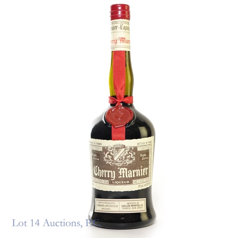 Cherry Marnier "Triple Cerise" Liqueur: Cherry Marnier "Triple Cerise" Liqueur. 48 Proof, 750 ml. Bottled in Paris, France. Please see photos for additional details.