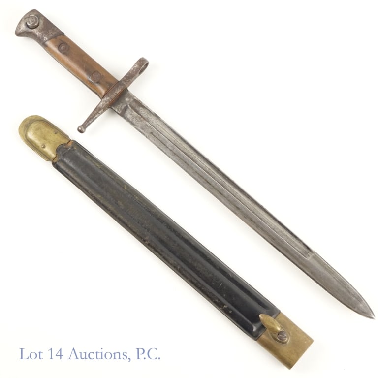 Italian Model 1891 Bayonet & Leather Sheath: Italy - model 1891 bayonet. Blade: 12". Overall length: 16.25". Press stud moves easily. One side of the ricasso is stamped C. GNUTTI (Carlo Gnutti S.p.a.). Bottom of pommel is stamped "VII / 10803",