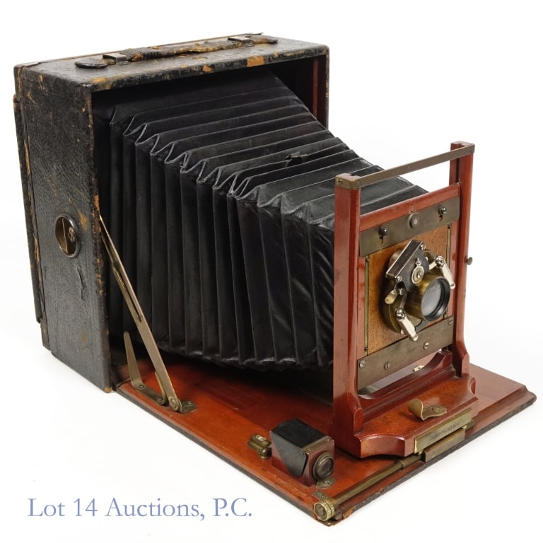 Pony Premo No. 5 Box Camera: Rochester Optical Co. Pony Premo No. 5 foldable box camera. Produced 1896 - 1903. Bellows appear fully intact. Viewfinder present. Perpendicular liquid levels functioning. Outer leather case shows con