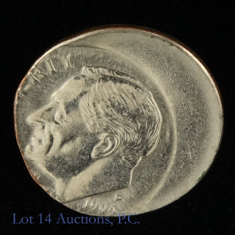1990-P USA Clad Roosevelt 10c 33%-Off-Center Error: 1990-P United States clad Roosevelt dime (Philadelphia Mint) off-center error coin. Designer John R. Sinnock. Struck 33% off-center when the planchet did not enter coinage press correctly and was stru