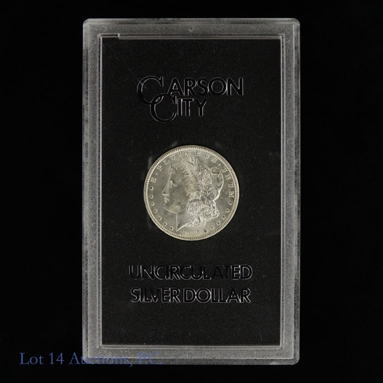 1883-CC USA Silver Morgan Dollar (GSA): 1883-CC United States silver Morgan dollar (Carson City Mint) in GSA holder, but does not include the original box or COA. Designer is George T. Morgan. Metal is 90%-silver. Mintage is 1,204,000 with 