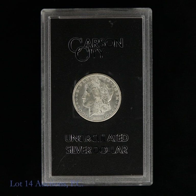1883-CC USA Silver Morgan Dollar (GSA): 1883-CC United States silver Morgan dollar (Carson City Mint) in GSA holder, but does not include the original box or COA. Designer is George T. Morgan. Metal is 90%-silver. Mintage is 1,204,000 with 