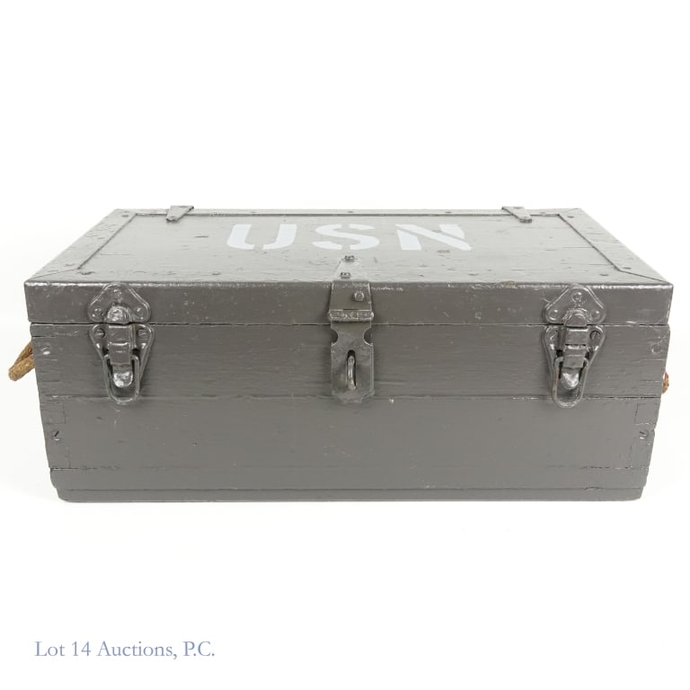 U.S Navy Storage Box Locker & Padlock: A U.S Navy storage box with a USN padlock. The box has a dark gray base and measures approximately 11"L x 20"W x 7.5"H. There are 3 latches and 2 straw rope handles on the sides. The inside is a light