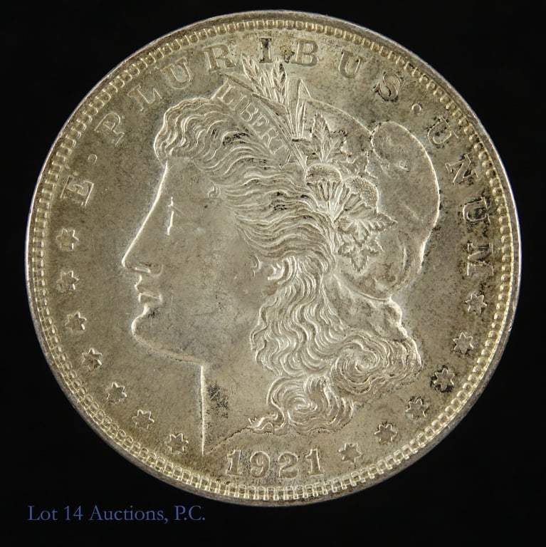 1921 (P) USA Silver Morgan Dollar: 1921 United States silver Morgan dollar (Philadelphia Mint). Designer is George T. Morgan. Per consigner, with creamy milky original luster and slight toning in CH BU condition. Metal is 90%-silver an