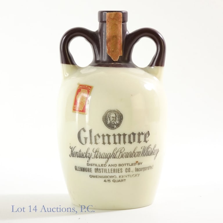 1940s/50's Glenmore Bourbon (7 Yr Crock) **: Glenmore Kentucky straight bourbon whiskey. 7 years. 90 proof. 4/5 quart. Comes in double loop handled ceramic crock embossed "Federal law forbids sale or re-use of this bottle". ** This bottle is NOT