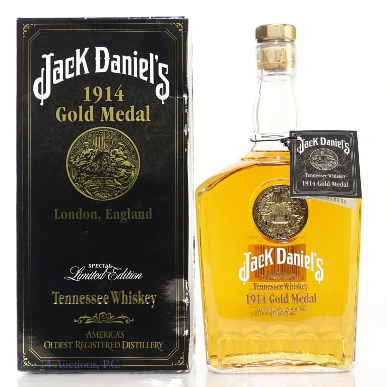 Jack Daniel's 1914 Gold Medal Whiskey: Jack Daniel's 1914 Gold Medal London, England Tennessee Whiskey, 90 Proof, 750 ml, Bottle #019255, Box and neck tag included, some wear shown on box.