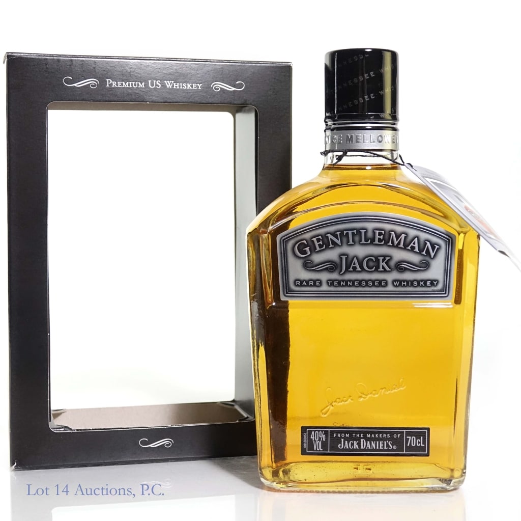 German Imported Gentleman Jack DM Tenn. Whiskey: German Imported 2007 Gentleman Jack Double Mellowed Tennessee Whiskey, 80 Proof, 70cl (700 ml). Box and neck tag included. Neck tag and writing on box are in German.