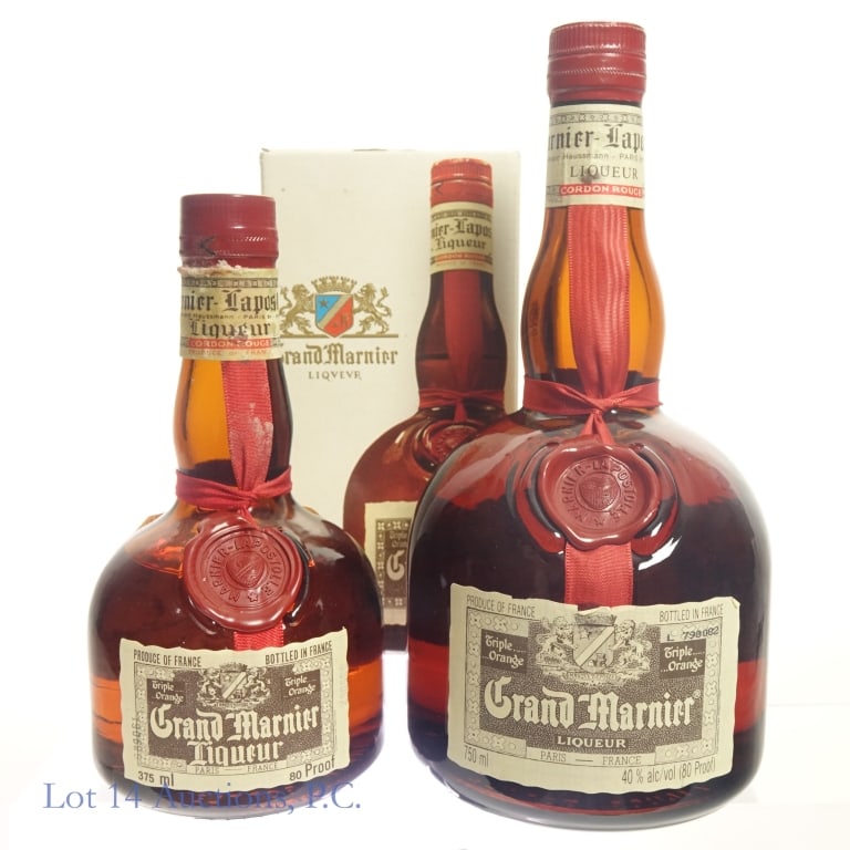 Grand Marnier Liqueur (2): Two bottles Grand Marnier Liqueur, one still in its original box. The boxed one is 375ml, 80 proof. The unboxed one is 750ml, 80 proof.
