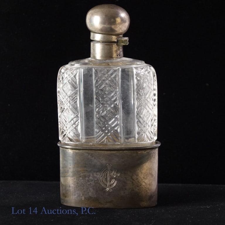 Cut Glass Sterling Silver German Flask: Cut glass flask. Base cup is marked with the letters "BH" in a rectangle, what we believe to be "825", and the letter "S" - located on the back of the cup near the rim. The front of the cup is engrave
