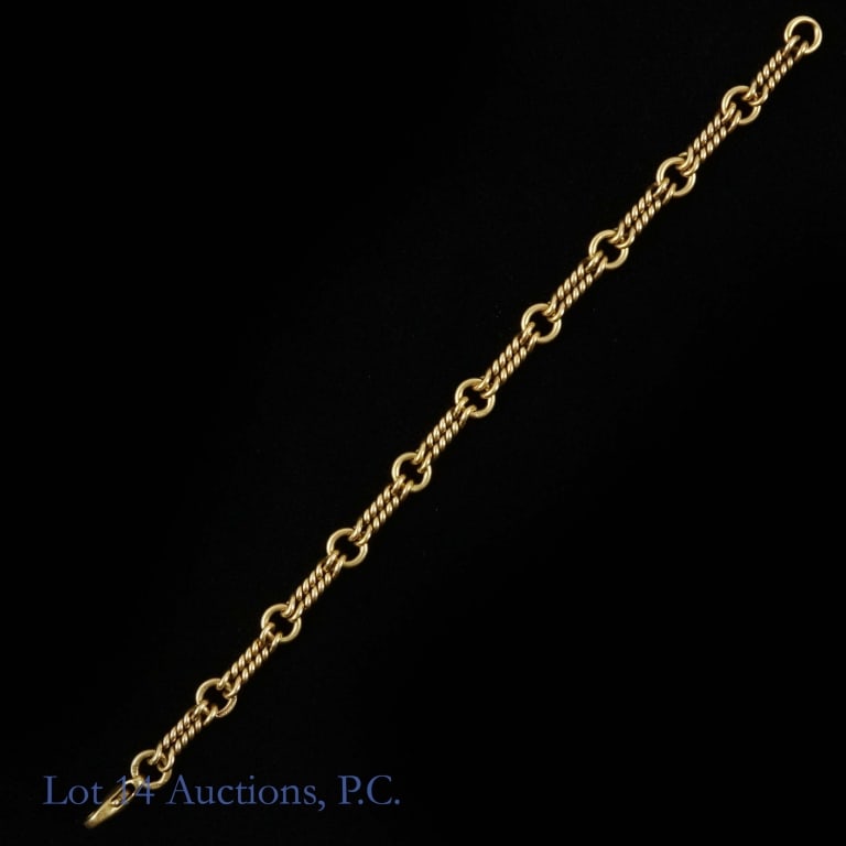 18k Y Gold Sinigaglia Bracelet: Yellow gold bracelet. Marked "18kt", "Italy", and "(star) 272" on the first link next to the clasp ( we believe the 272 designation refers to the manufacturer, Sinigaglia). Electronically measures as
