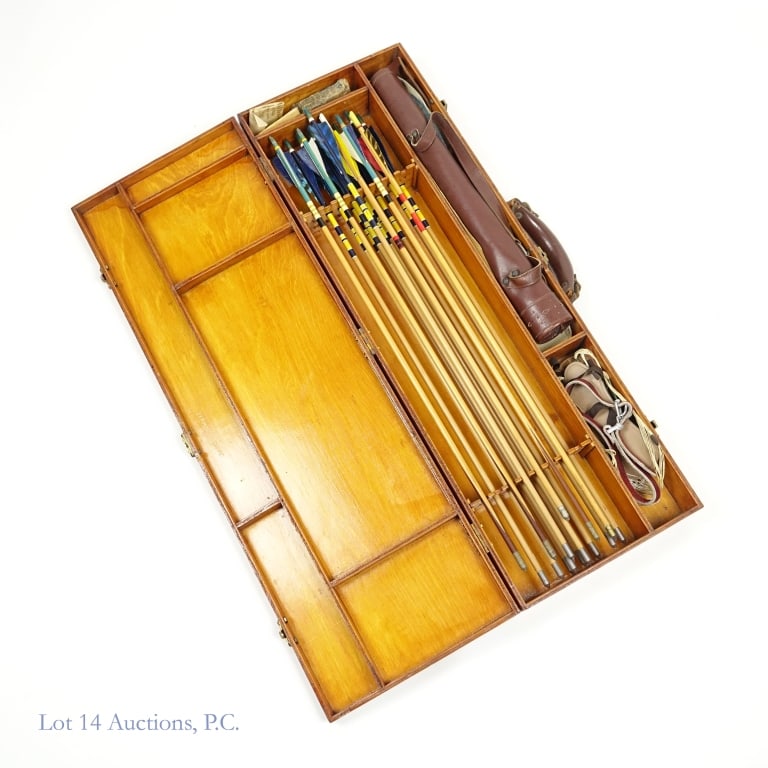 Arrow Set / Bow Quiver: An arrow set and bow quiver inside a wooden case. There may have been more arrows originally, but only 15 arrows included - all about 25" long. Brown leather bow quiver that measures 17.5". Other misc