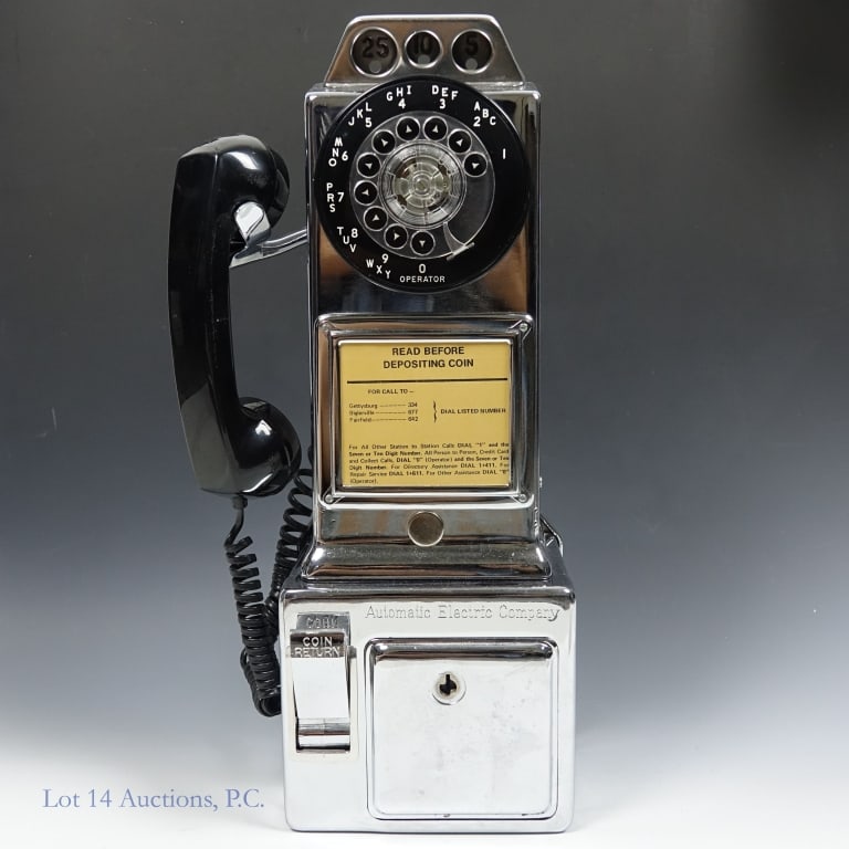 Rotary Dial Working Coin Payphone Chrome: Automatic Electric Company 3 slot coin payphone in chrome. Rotary dial. Fully restored and operational as a land-line phone. Does not operate by coins. Measures approximately 18' x 7' x 5.5". Weighs a