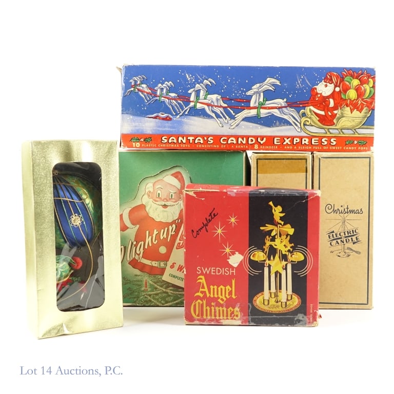 Vintage Christmas Items (6): Collection of 6 vintage Christmas items. Includes: 2 Christmas Electric Candles. Measures 11" tall (with plastic flame piece). Both candles come in original boxes. **** Santa's Candy Express Toy Set.