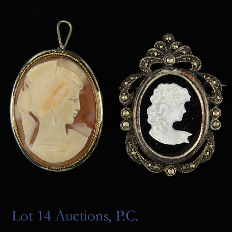 800 Silver / Shell and M.o.P Cameos: Two (2) cameos. Shell cameo is set in 800 (marked) silver. .8 x 1.1". Mother of pearl cameo is set with marcasite, .9 x 1.3". Both cameos can be worn as a pendant or brooch.