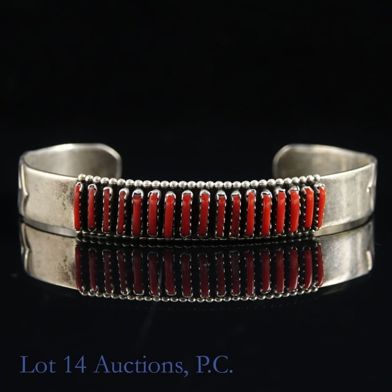 Navajo / Zuni Sterling Silver & Coral Cuff: Native American (style) sterling silver and coral cuff bracelet. Signed on the back with a "Y", and marked "sterling". Research indicates this is Navajo (possibly Zuni) coral needlepoint, with the "Y"