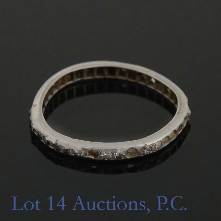 14K W Gold Ring (Missing Stones): Ring with some missing stones. No markings, but acid tests at 14 karat gold. We cannot confirm the identity of the stones. Size 4.5. Weight: 1.3 grams.