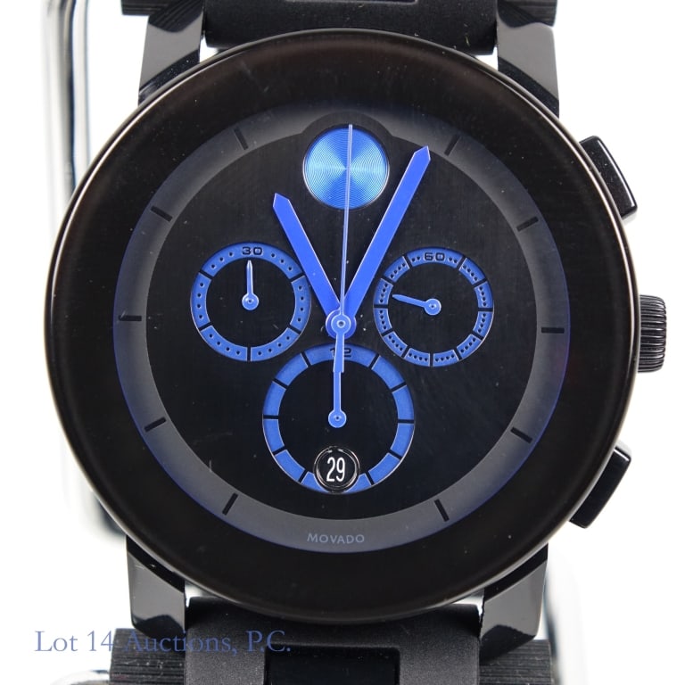 Movado Bold Black Stainless Steel Watch: Movado Bold Black Stainless Steel Watch. Model 01 1 29 6016. Fully black watch with blue accents. Seems to be a few small scratches on the band. See photos for more details on condition.