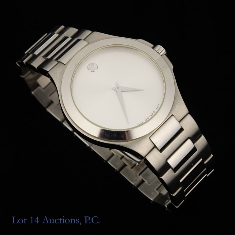 Movado Stainless Steel Men's Watch: Movado Stainless Steel Watch. Model 01 1 14 1032. Silver dial. With original box. Seems to be a few small scratches on the band. The box also has some scuffing on the interior and exterior. See photos