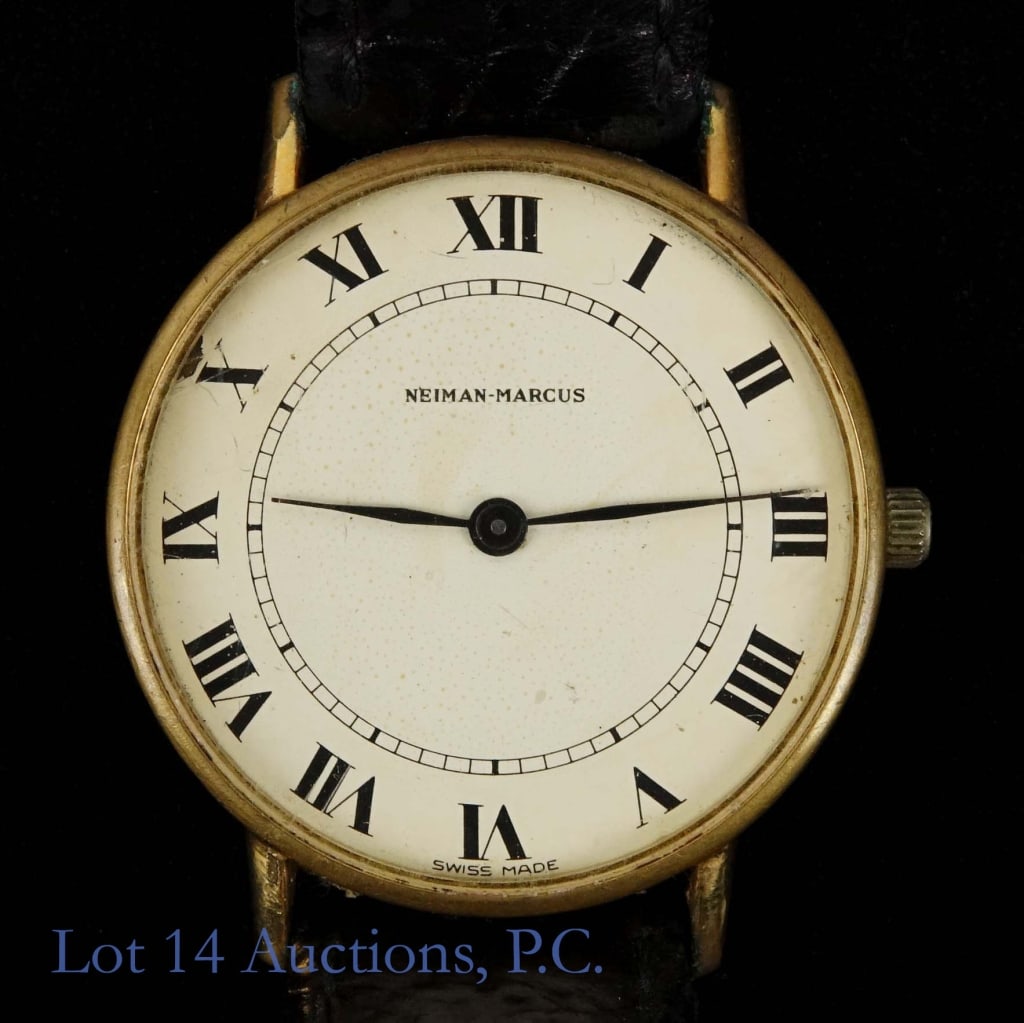 Neiman Marcus Watch, Not Running: Watch for parts or repair - Neiman Marcus (store) branded Swiss made men's watch. 31mm case. 6.7mm thick. 36.6mm lug-to-lug. Crown will set hands, but will not push in to lock or wind. Some damage to 