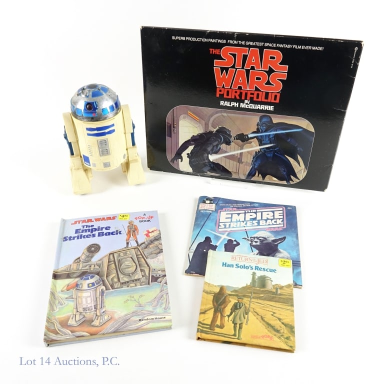 1977 First Printing Star Wars Portfolio & More (5): 1977 First Printing Star Wars Portfolio & More (5). A collection of Star Wars ephemera including a first printing of the Star Wars Portfolio by Ralph McQuarrie with 21 prints. Also included are pop-up