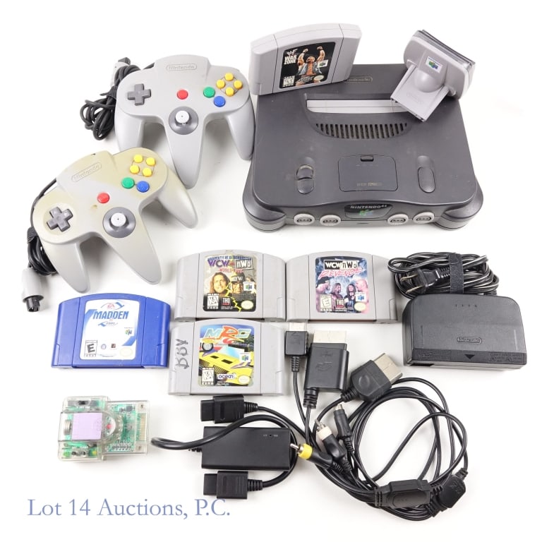 Nintendo N64 Console with Accessories & Games (5): Nintendo N64 console with Memory Expansion Pak, 2 controllers, power adapter, RCA cable, HDMI adapter, Tilt Pak and Game Boy Transfer Pak. Tested and working per consigner. Lot also includes 5 games: 
