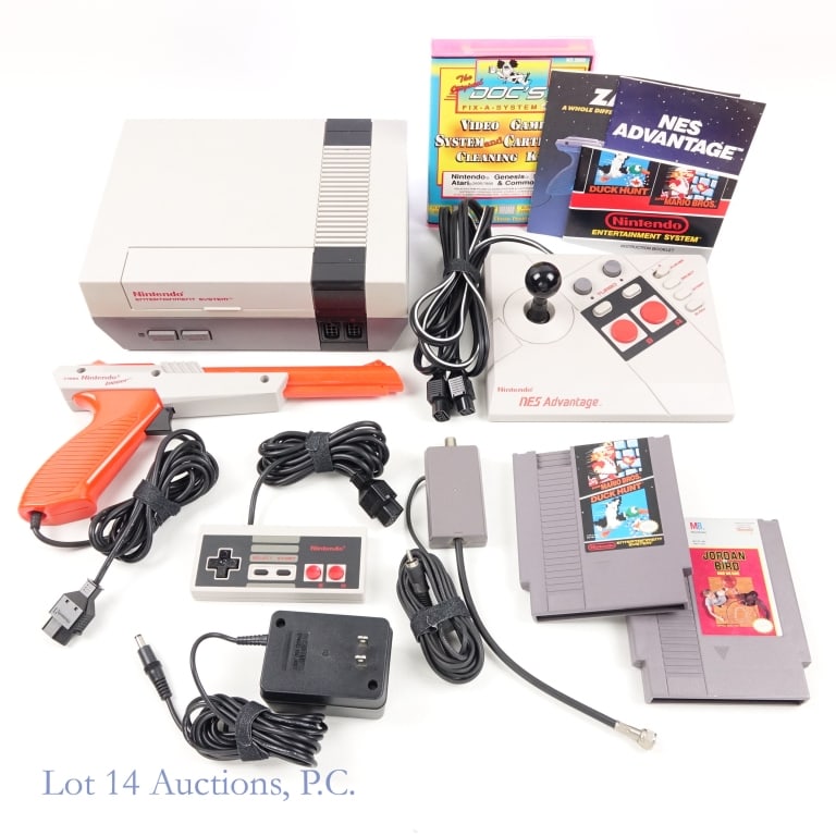 Nintendo Entertainment System Console & Games (2): Nintendo Entertainment System Console & 2 Games. Model No. NES-001. SN: N10668807. Includes AC adapter, RF switch, 1 controller, 1 Nintendo Zapper, 1 NES Advantage, cleaning kit, and 3 manuals. Tested