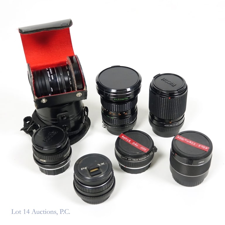 Pentax SLR Lenses Filters Tele Converters: Pentax camera accessories. Lot includes Pentax K mount lenses, filters and tele converters. Sears macro 135mm lens. Sears 28mm lens. Pentax-M 50mm lens with filter attached. Sears 3X tele converter. S