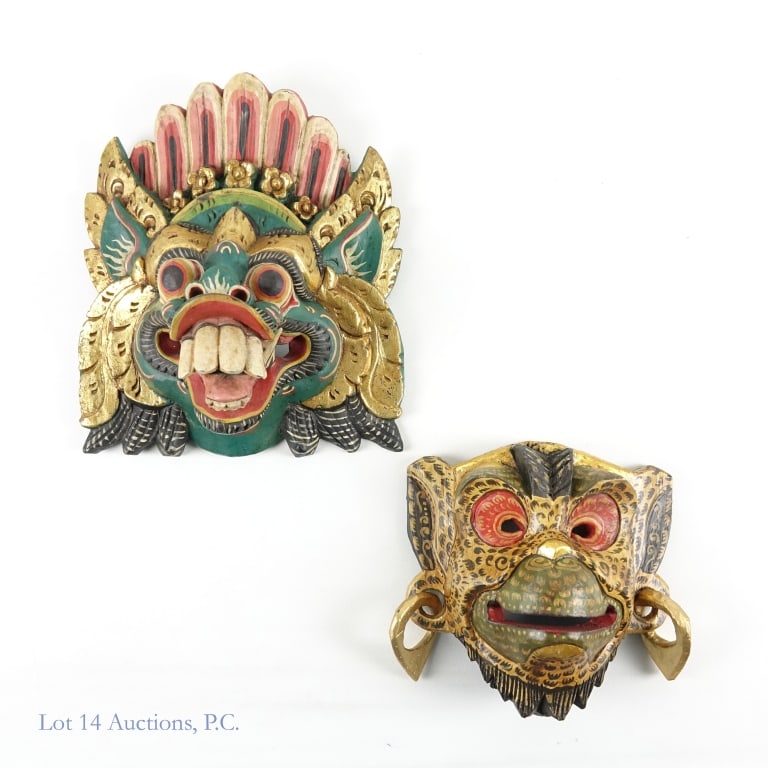 Indonesian Wooden Masks (2): 2 Indonesian Wooden Masks. No markings or labels detected. The masks measure approximately 11.5"L x 9.5"W and 7.5"L x 8"W. Some paint chipping.