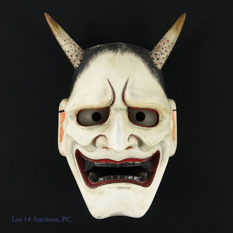 Hannya Noh Theater Mask, Japan: Hannya mask used in traditional Noh theater in Japan. This mask represents an onryo (jealous or vengeful female demon). Hand carved wood and hand painted. Approximately 11" tall (top of horns to chin)