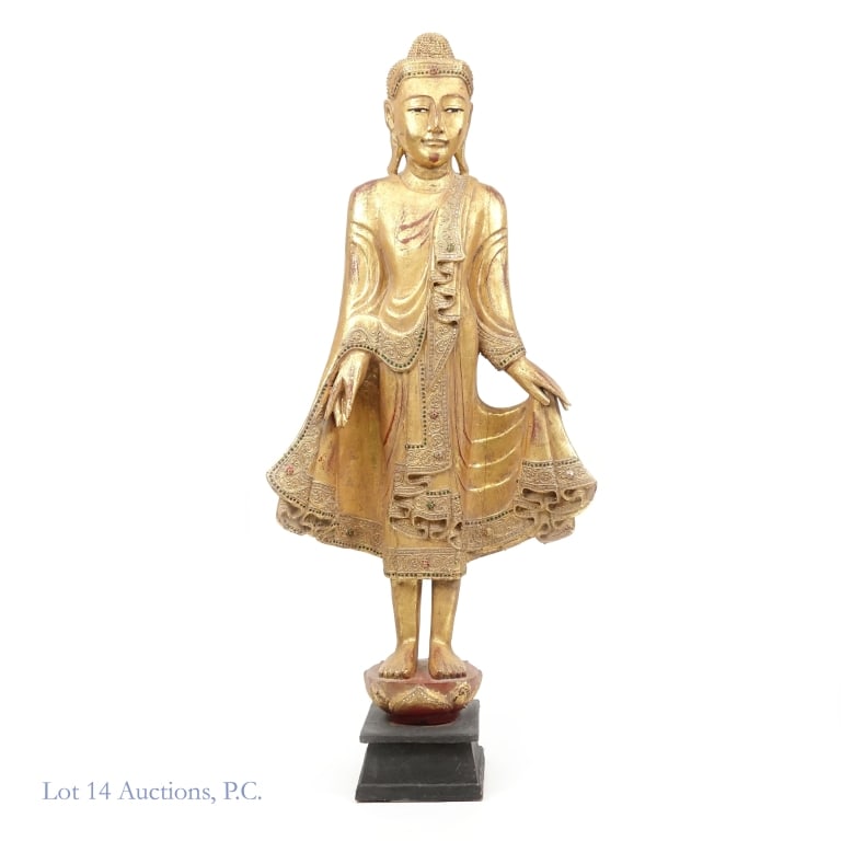 Gilded Wooden Mandalay Buddha Statue: Hand carved gilded Mandalay-style wooden Buddha statue decorated with glass tiles and ornate carvings, probably from the early to mid 20th century. Some stable stress cracks are visible and there are