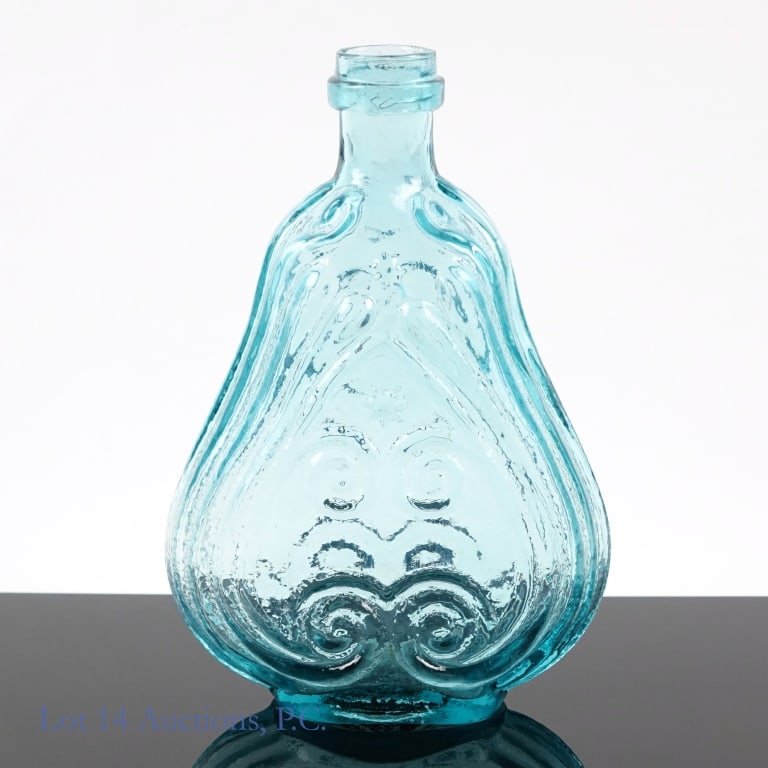 American Aqua Scroll Flask (c. 1850-1860): American aqua scroll glass flask. Circa. 1850 - 1860. Mouth has 5 small scratches, but only one small fleabite chip.
