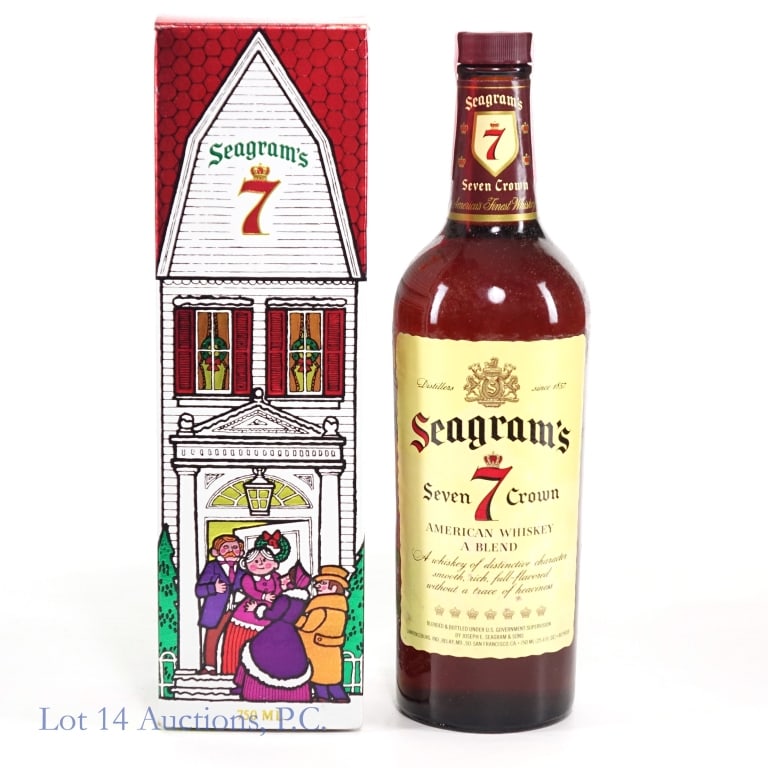 70s/80s Seagram's 7 Crown American Whiskey: Seagram's 7 Crown Blended American Whiskey, 80 Proof, 750 ml. Late 1970s - early 80s tax strip, "79" moulding on the bottom. Tax strip fully intact. Original Christmas gift box included.
