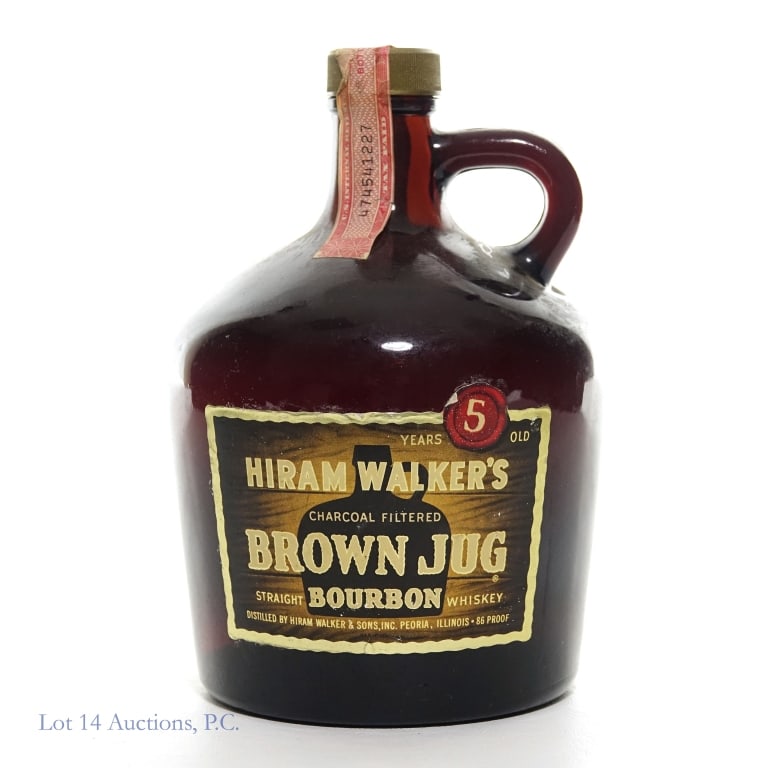 60s/70s Hiram Walker's 5Yr. Brown Jug Bourbon: Hiram Walker's 5 Year Brown Jug Straight Bourbon Whiskey, distilled by Hiram Walker & Sons, Inc., Peoria, Illinois. 86 Proof, 4/5 Quart. "65" and "72" moulding on the bottom. Tax strip intact. Glass j
