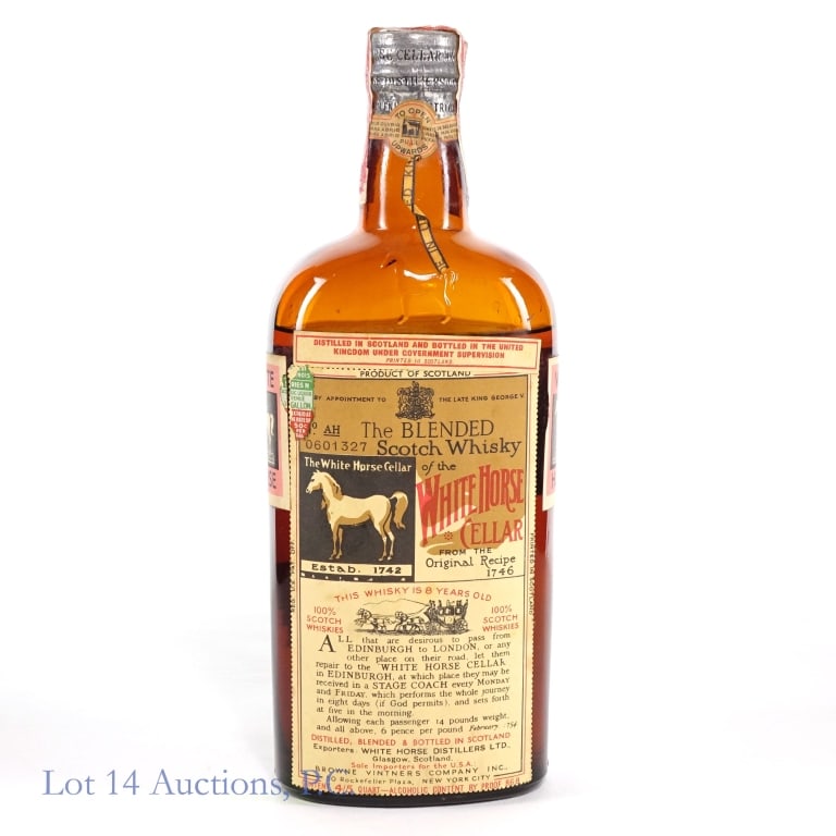 30s/40s White Horse Cellar Blended Scotch (4/5 Pt): White Horse Cellar Blended Scotch, 86.8 Proof, 4/5 Pint. Below shoulder fill. 1934-1944 tax strip has some tears but is intact overall. Original seal on the cap fully intact.
