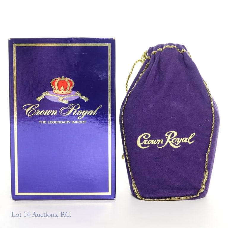 1980 Crown Royal Canadian Whisky: 1980 Crown Royal fine de luxe blended Canadian whisky, 80 Proof, 750ml. Purple drawstring bag and box included.