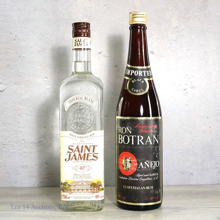 Ron Botran Anejo, Saint James Rum (2 x 750ml): 1 Black Label Ron Botran Anejo Guatemalan Rum, 80 Proof, 750ml. "85" bottle mould. May leak when inverted. 1 Imperial Blanc Plantations Saint James Martinique Agricole Rum, 80 Proof, 750ml.