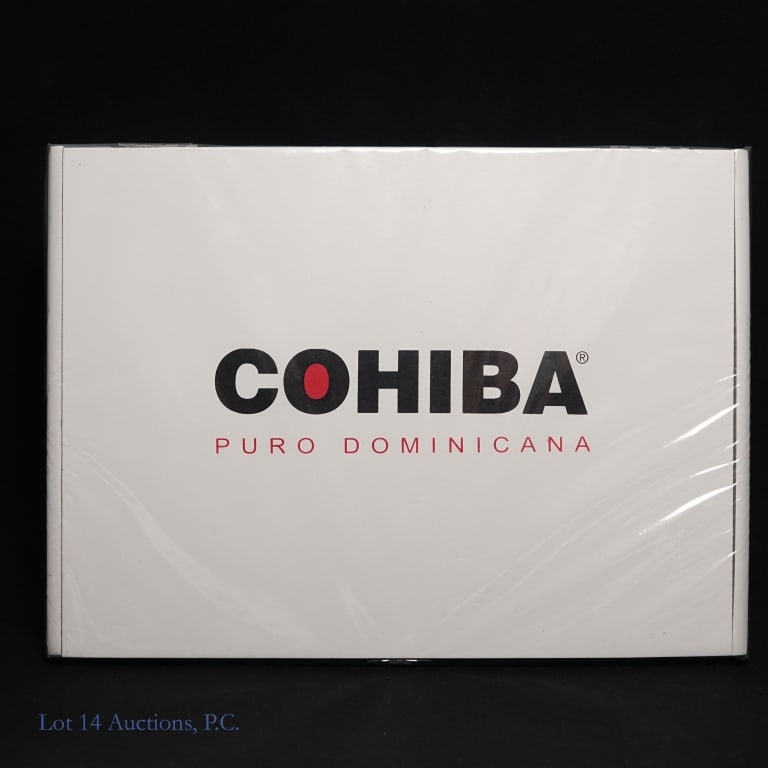Cohiba Puro Dominicana Churchill Cigar (25 Pack): Cohiba Puro Dominicana Churchill Cigars, 7"x49, Pack of 25 sealed in wooden case. Wrapper: Habano, Origin: Dominican Republic. Consigner stored these cigars since original purchase in a humidity-contr