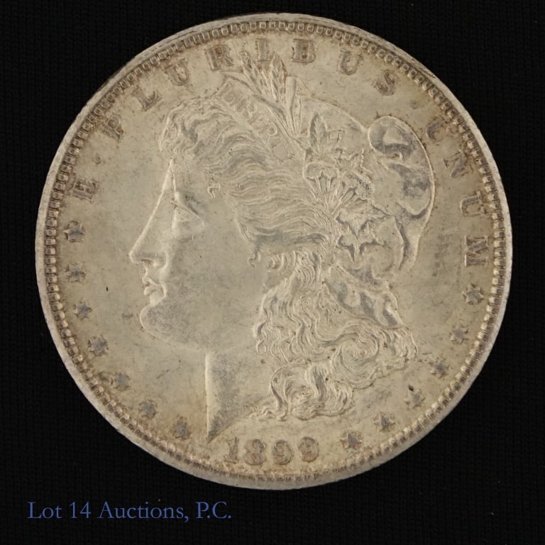 1899-O USA Silver Morgan Dollar: 1899-O United States silver Morgan dollar (New Orleans Mint). Metal is 90% silver and weighs 26.73 grams. Mintage is 12,290,000. Whitman 2026 Red Book price guide value at EF-40 is $50. Silver content