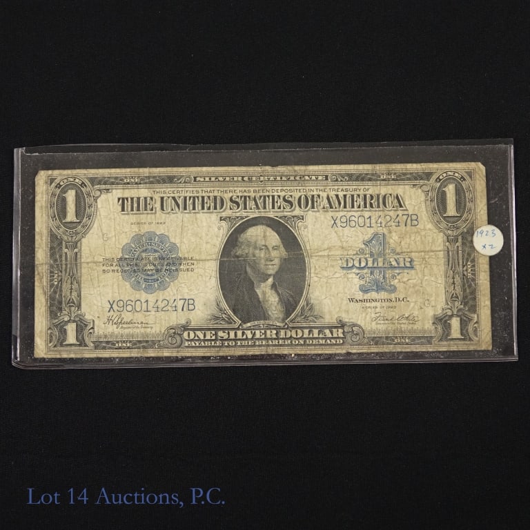 1923 $1 USA Silver Certificate - Blue Seal: (F-237) Series 1923 $1 United States silver certificate blue seal (Spellman / White) S/N X-96014247-B. Whitman's Guide Book to U.S. Paper Money 8th Edition price guide value at F-12 is $45 (p.36). ***