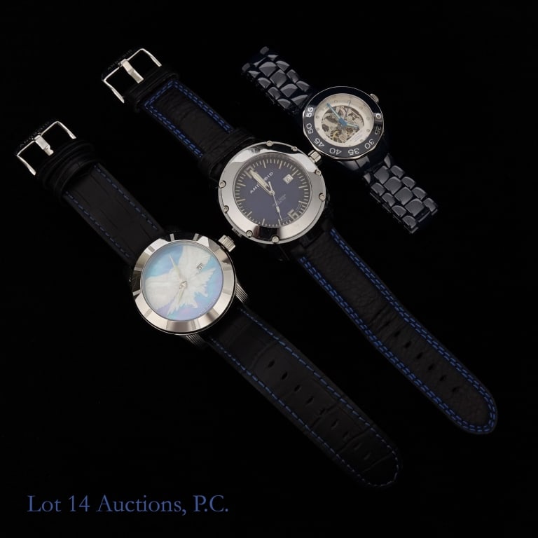 Three Android Watches + Box: Three watches from the brand Android, now called Aragon. The first is a limited edition Tritium T100, AD720, 148/300. The second watch's back has seemingly been replaced and therefore does not have a 
