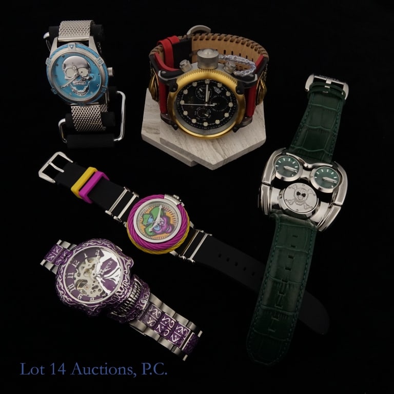 Invicta Skull Themed Watches (5): Five new Invicta watches of various styles, all themed around skull designs. The first is a Bolt Nautical Ensemble model no. 37451 in blue and chrome. The second is a Pro Diver model no. 40459 with a 