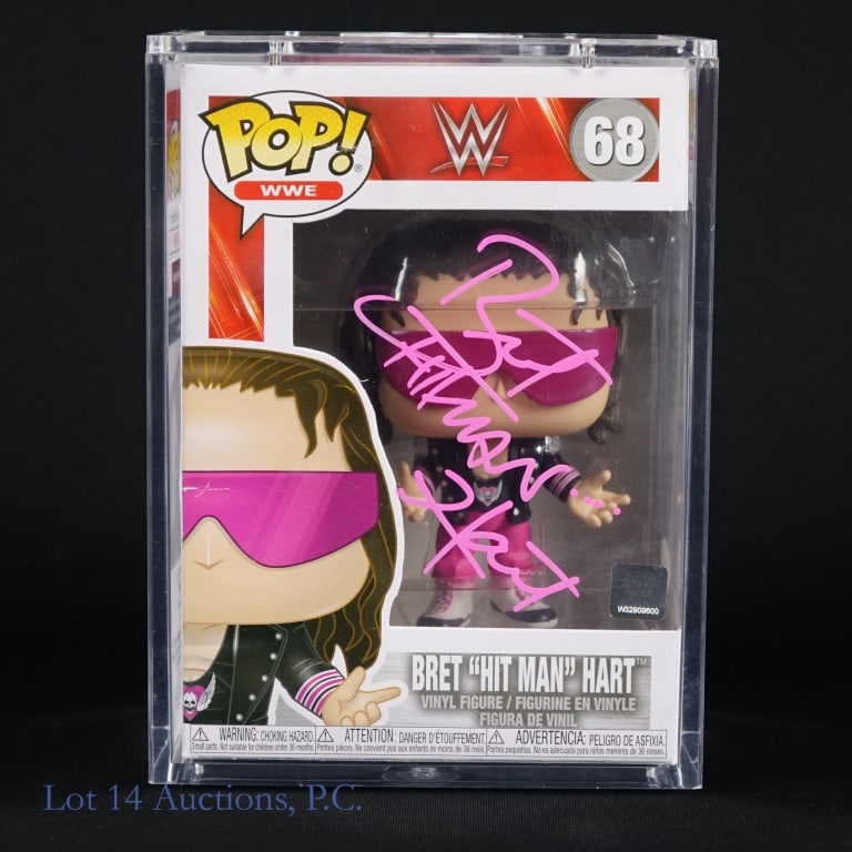 WWF / WCW Bret "Hit Man" Hart Signed Funko, JSA: WWF / WCW wrestler Bret "Hit Man" Hart signed Funko Pop figure. Plexiglass display case. JSA COA: WA100380. This item was signed in the presence of a JSA representative on 4/1/22 in Dallas, TX.
