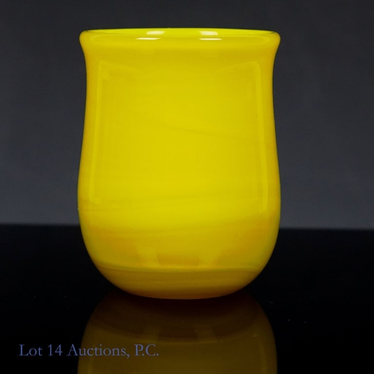 Charles Lotton Miniature Glass Art Vase: Small piece of glass art by renowned American glass artist Charles Lotton (1935-2021) in Lotton's "Mandarin Yellow" style. Signed "Charles Lotton 2010" on the underside. About 2" tall, 1.5" wide. Good