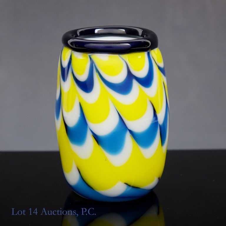 Charles Lotton Miniature Glass Art Vase: Small piece of glass art by renowned American glass artist Charles Lotton (1935-2021) in a blue, white, and yellow chevron design. Signed "Charles Lotton 2013" on the underside. Approximately 2.5" tal
