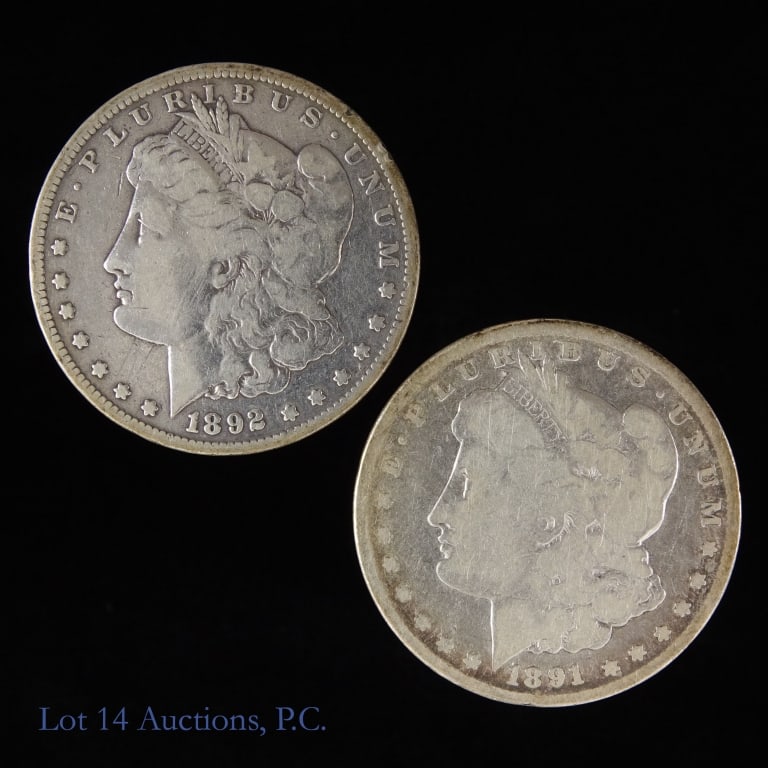 1891-CC & 1892-CC USA Silver Morgan Dollars (2): Two (2) United States silver Morgan dollars (Carson City Mint). Metal is 90% silver and weighs 26.73 grams (ASW is 0.7734 ozt.) each. Details as follows: ---1891-CC mintage 1,618,000 (*/ weighs 25.80 