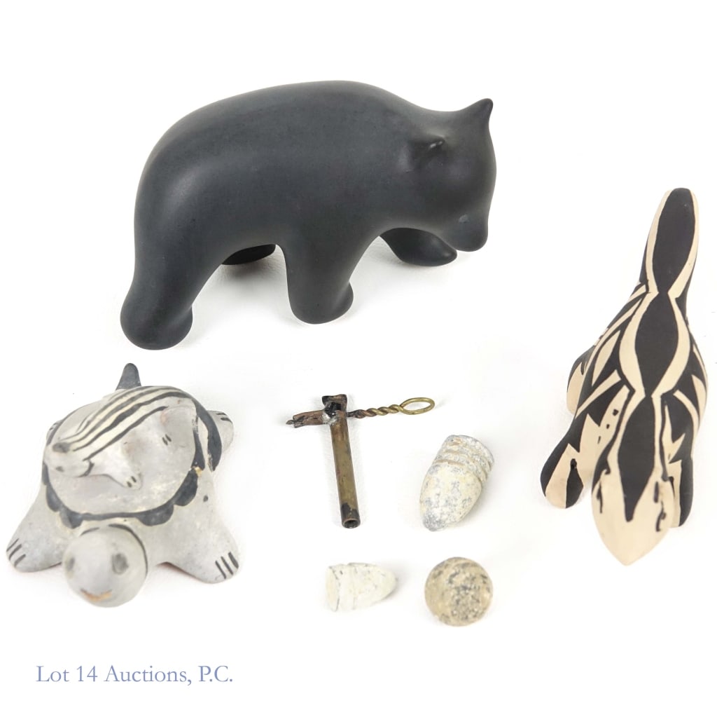 Traveler's Lot, Pottery, Civil War Artifacts: 4 Civil War artifacts: 2 Minie balls, 1 musket ball and a cannon friction primer, bear figure from Pigeon Forge Pottery, 2 Native American pottery figures: skunk signed M. Toya Jemez and turtle signed