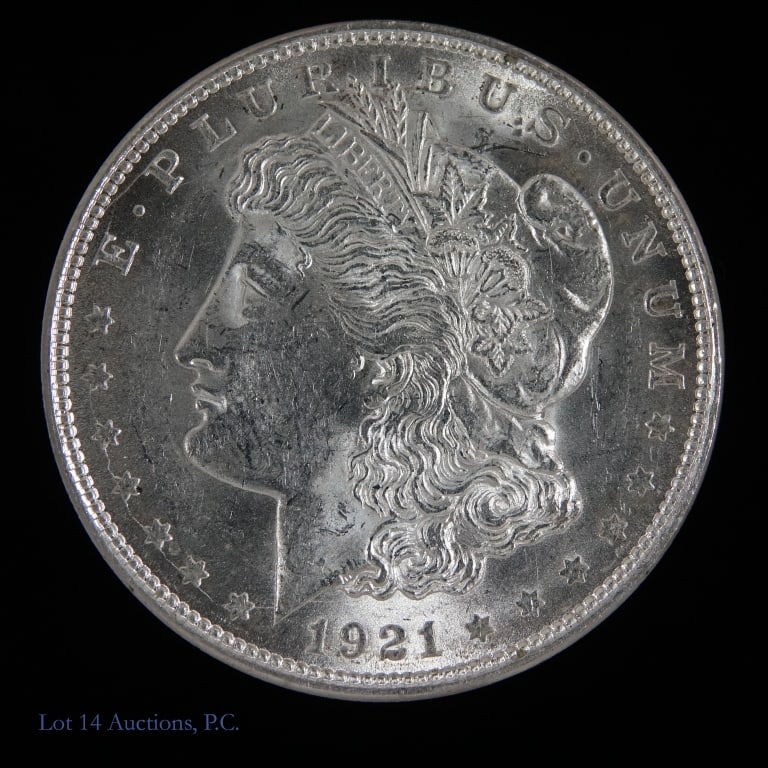 1921 (P) USA Silver Morgan Dollar (BU): 1921(P) United States silver Morgan dollar (Philadelphia Mint). Per consigner, in BU condition with good luster. Metal is 90% silver and weighs 26.73 grams. Silver content confirmed on Lot 14 Auctions