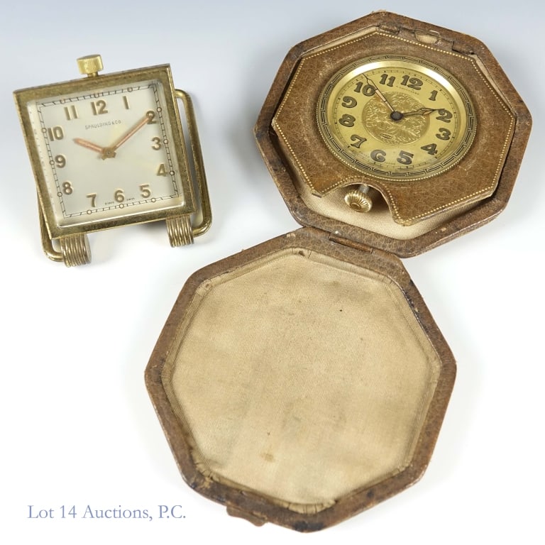 1920s A. LeCoultre & Spaulding 8 Day Travel Clocks: Two Travel Clocks. NOT RUNNING. 1 - 1920s A. LeCoultre (Not LeCoultre) 8 Day Travel Clock in leather case. Not running. 15 jewels, 3 adjustments. Movement S/N 113766. Blued cathedral hands have some o