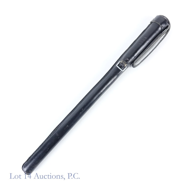 Leather Encased Baton Club: Hard plastic baton club sewn in a tight leather sheath. Lightly used. Approximately 18.5" long. Leather sheath has "1089" embossed near handle. Tested in our shop and works.
