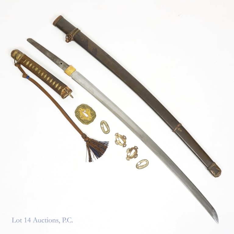 Samurai Sword (Katana) & Sheath - WWII Era Japan: Samurai sword / katana. Per consigner, World War II era Japan. Tang is signed on both sides, and per consigner reads: Kago Yashida Ouitahen Saikish Tetpomachi Nipohonsen Saikieki-tome. Tsuka (handle) 